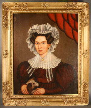 Attributed to New England is this 19th century portrait of a woman with her dog. The painting is expected to fetch $2,800-$3,200. Image courtesy Case Antiques.