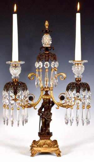 One of a pair of Regency gilt and bronzed diamond cut glass candelabra, c 1814, £12,750 from WR Harvey & Co (Antiques) Ltd