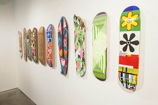 Skateboard art on display at NYC gallery during Armory Week