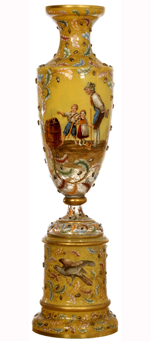 Signed Moser two-part pedestal vase with yellow opaque background and leaf and applied acorn décor. Price realized: $38,000. Woody Auction image.