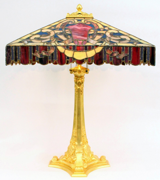 Duffner & Kimberly leaded glass and gilt bronze table lamp, circa 1910, 30 1/4 inches tall with 20 1/2 inch square shade. Price realized: $9,000. Ahlers & Ogletree image.