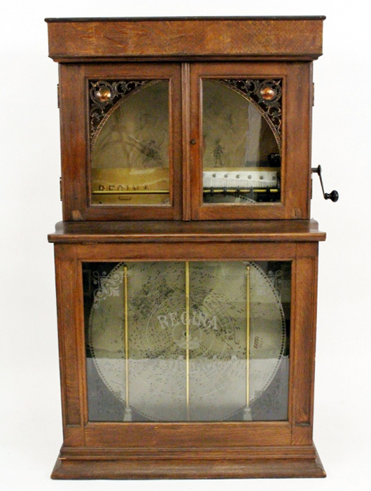 Regina ‘Corona’ Model No. 34 oak cased upright double combed nickelodeon music player, circa 1899. Price realized: $14,000. Ahlers & Ogletree image.