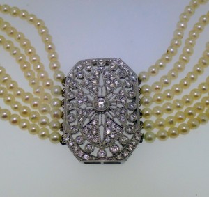 Pearl and diamond choker necklace with 18K white gold diamond enhancer. Charleston Estate Auctions
