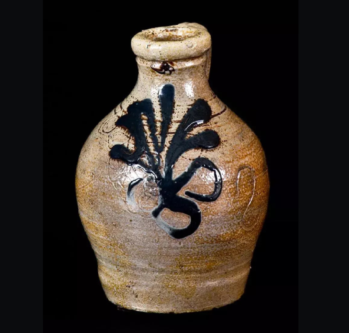 The folk-art charm of miniature stoneware vessels