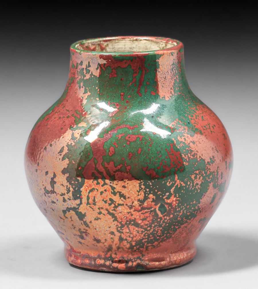This Hugh Robertson oxblood vase for Dedham Pottery, sporting green and red tones, realized $2,000 plus the buyer’s premium in March 2024. Image courtesy of California Historical Design and LiveAuctioneers.