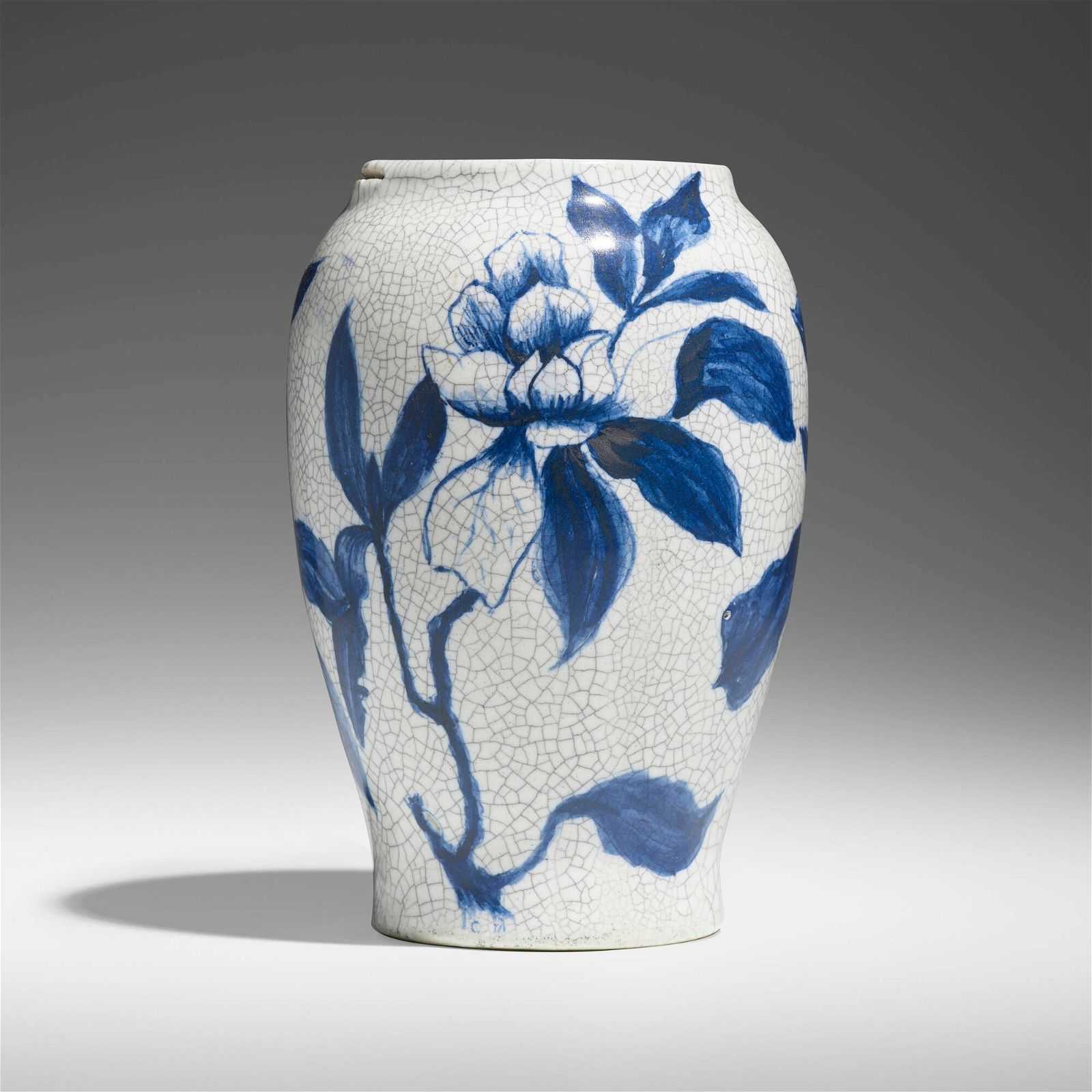 A vase decorated with images of magnolias by Hugh Robertson for Dedham Pottery achieved $14,000 plus the buyer’s premium in September 2023. Image courtesy of Rago Arts and Auction Center and LiveAuctioneers.